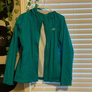 Teal north face raincoat